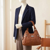 Sac souple femme Lola à poches zippées